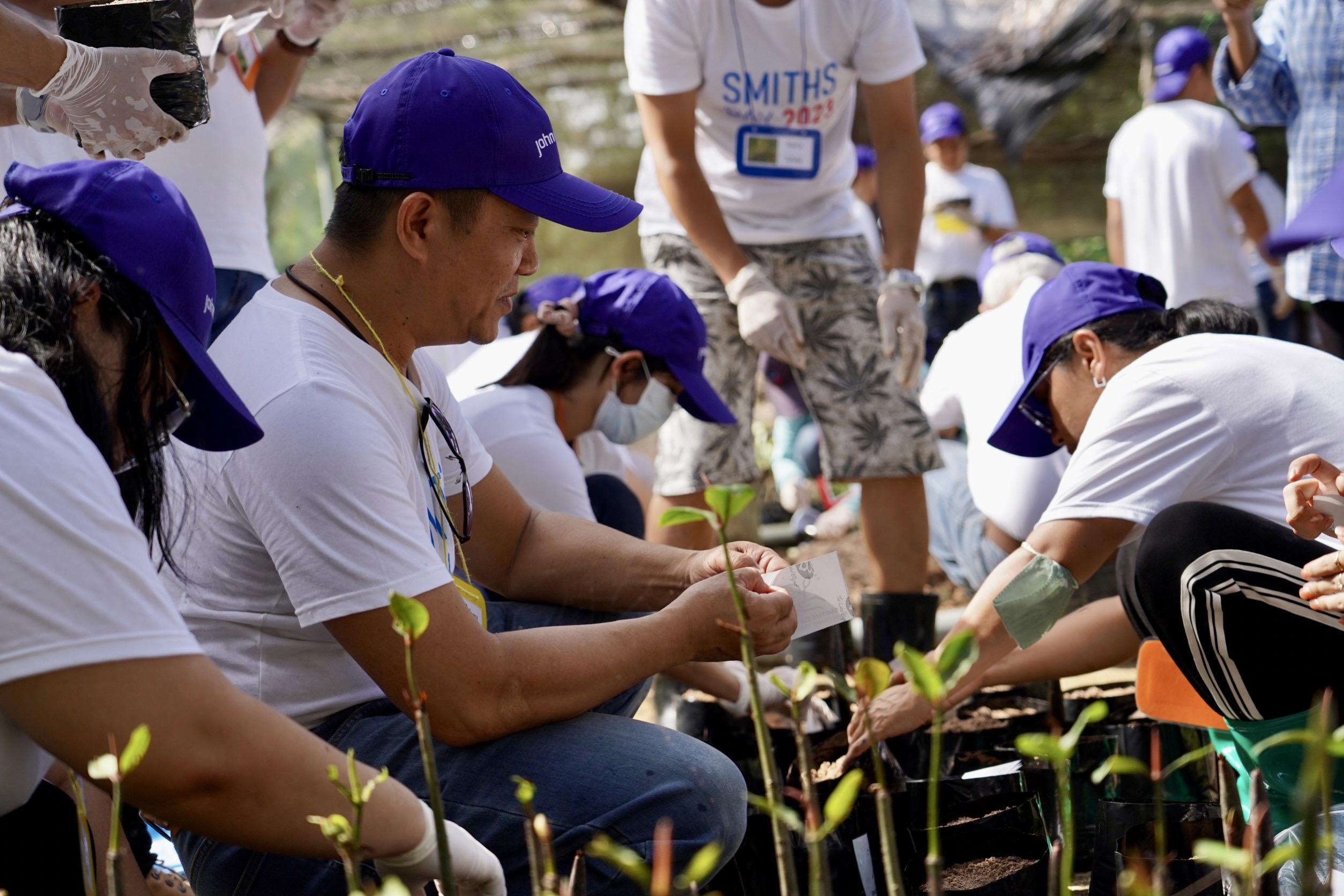 Men Planting In Field