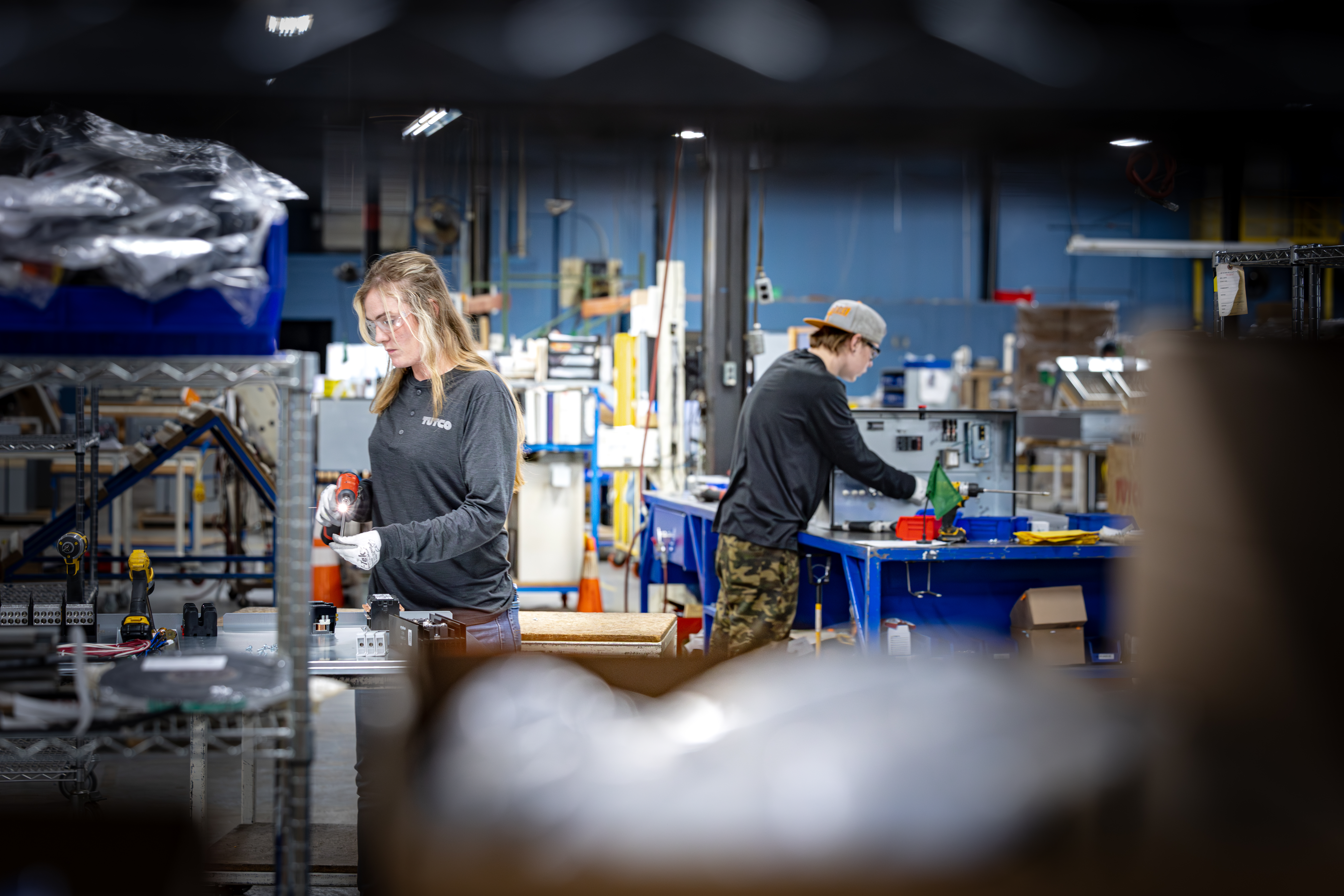 Tutco Employees Working At Desks