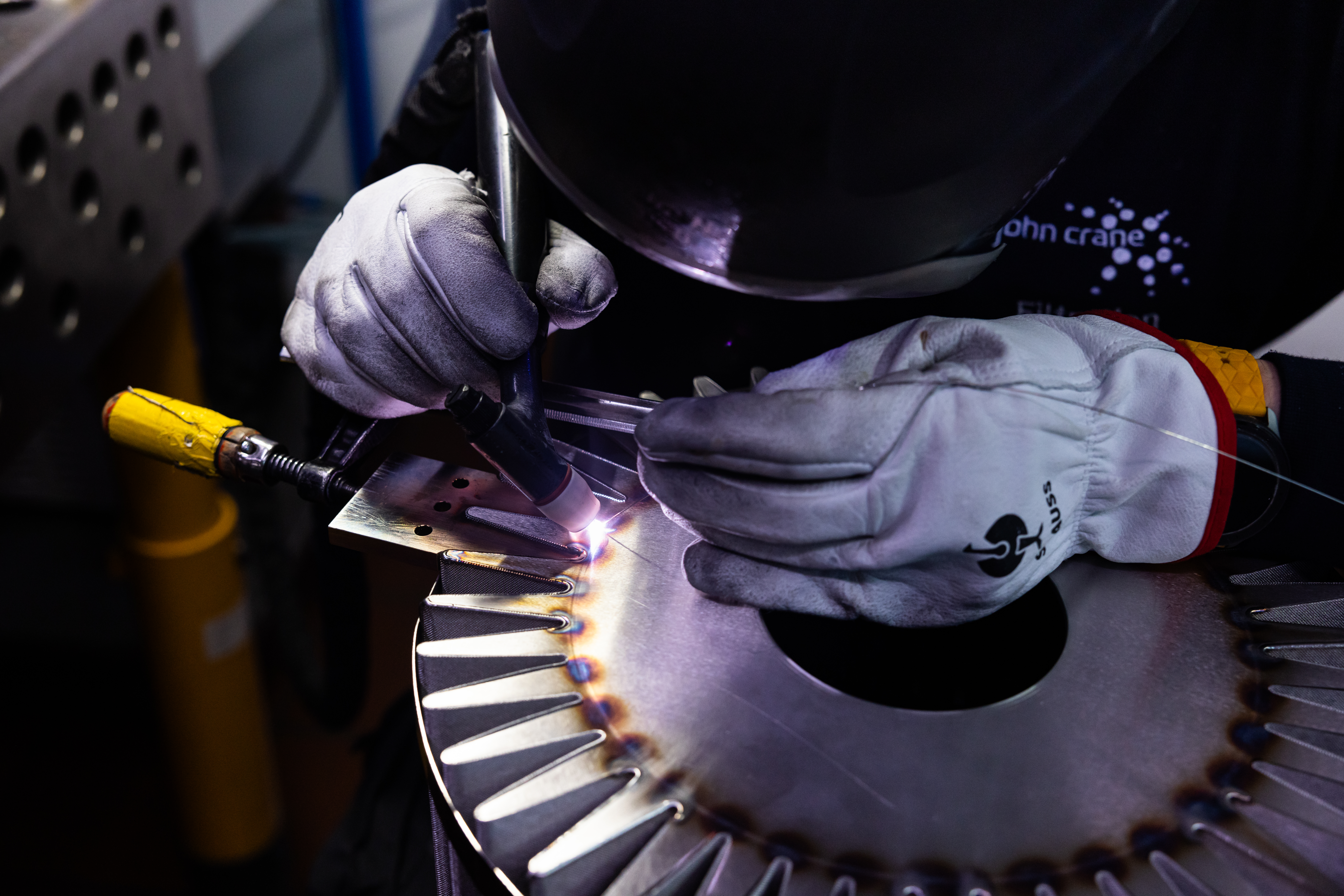 John Crane Worker Welding Metal