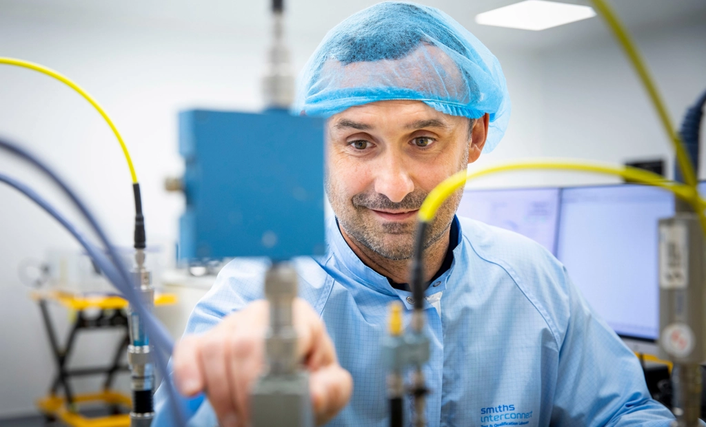 Smiths Interconnect Employee In Hairnet